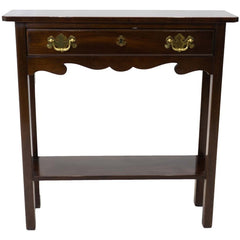 Front view of a vintage Stickley end table with one drawer, two handles, and a bottom shelf.