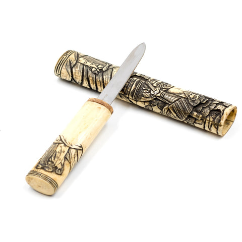 Small dagger with sheath. Beautiful scene etched into the sheath. Sheath...
