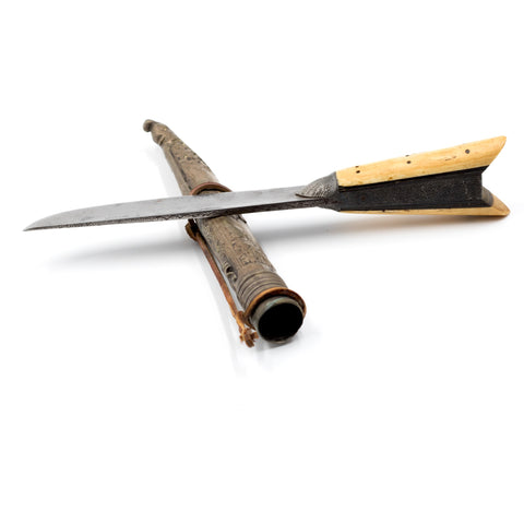 East Asian knife with dragon tipped scabbard.Dimensions: Approximately 1...